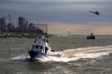 New York City Police Department Harbor Unit, helicopter on the Hudson River in New York Harbor, New York, USA.