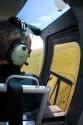 Helicopter pilot viewing alfalfa hay harvest in Jerome, Idaho, USA.