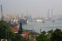 Activity on the Saigon River on hazy polluted day in Ho Chi Minh City, Vietnam.