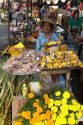 Woman selling items in the Cholon district of Ho Chi Minh City, Vietnam.