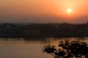 Sunrise over the Saigon River in Ho Chi Minh City, Vietnam.