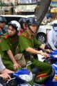 Vietnamese national soldiers ride a motorbike in Ho Chi Minh City, Vietnam.