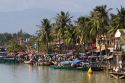 Boats on the Thu Bon River at Hoi An, Vietnam.