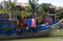 Laundry drying in a boat on the Thu Bon River at Hoi An, Vietnam.