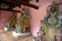 Buddhist religious guardian sculptures within the grounds of the Thien Mu Pagoda in Hue, Vietnam.