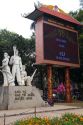 Monument to Vietnamese soldiers and a large digital clock counting down time until the Tet Lunar New Year in Hanoi, Vietnam.