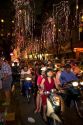 Vietnamese people ride motorbikes on Dong Khoi street during the last night of Tet Lunar New Year celebrations in Ho Chi Minh City, Vietnam.
