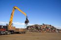 Hydraulic grapple lifting scrap steel for recycling at the Pacific Steel and Recycling center in Elmore County, Idaho.