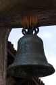 Bell from The Great Stone Church bell tower at the Mission San Juan Capistrano, California, USA.