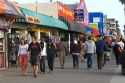 People and boardwalk retail space at Venice Beach, Los Angeles, California.