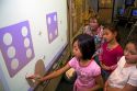 Kindergarten students use an interactive whiteboard in the classroom of a public school in Boise, Idaho, USA. MR