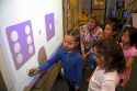 Kindergarten students use an interactive whiteboard in the classroom of a public school in Boise, Idaho, USA. MR