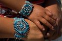 Turquoise bracelets crafted and worn by a Navajo Indian mother and daughter from Arizona, USA. MR