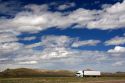 Long haul truck traveling on Interstate 80 in Carbon County, Wyoming, USA.