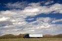 Long haul truck traveling on Interstate 80 in Carbon County, Wyoming, USA.