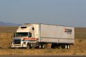 Truck hauling freight on Interstate 84 near Boise, Idaho, USA.