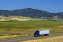 Truck transporting freight along Interstate 84 near North Powder, Oregon, USA.