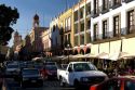 Street scene with traffic in the city of Puebla, Puebla, Mexico.