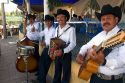 Mariachi band performing along the Xochimilco canals within Mexico City, Mexico.