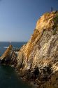 The La Quebrada Cliff Divers perform for the public from the cliffs of La Quebrada in Acapulco, Guerrero, Mexico.