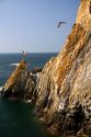 The La Quebrada Cliff Divers perform for the public from the cliffs of La Quebrada in Acapulco, Guerrero, Mexico.