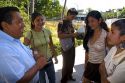 Teacher speaking with mexican college students on the campus of Universidad Autonoma de Guerro located in Acapulco, Guerrero, Mexico.