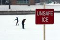 Sign warning ice skaters of unsafe ice in Boise, Idaho.
