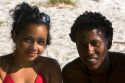 Native latin and afro-carribean multi-ethnic couple on the beach near Samara, Costa Rica.