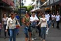 Pedestrians on a walking street in San Jose, Costa Rica.