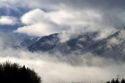 Fog and low clouds over the Cascade Range along Interstate 90 near Ellensburg, Washington, USA.