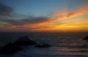 View of the Pacific Ocean at sunset from the Cliff House near San Francisco, California, USA.