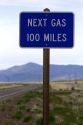 Next gas 100 miles road sign at the Oregon/Nevada border in McDermitt, USA.
