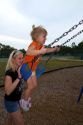Mother pushing her 3 year old daughter in a swing, Brandon, Florida, USA. MR