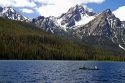 Canoeing on Stanley Lake in the Sawtooth Mountain Range near Stanley, Idaho, USA.