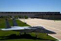 F-15 aircraft on display in the Terrazzo with dormitories in the background at the Air Force Academy in Colorado Springs, Colorado, USA.