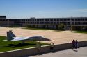 F-15 aircraft on display in the Terrazzo with dormitories in the background at the Air Force Academy in Colorado Springs, Colorado, USA.