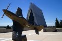 Bronze sculpure of vintage WW11 aircraft in front of the Cadet Chapel at the Air Force Academy in Colorado Springs, Colorado, USA.