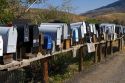 Mailboxes lined up for the delivery of mail in a rural area near Challis, Idaho, USA.