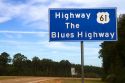 Road sign marking US Highway 61, The Blues Highway at the Mississippi and Louisiana border.