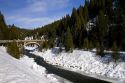 The Rainbow Bridge spanning the North Fork of the Payette River during winter, Valley County, Idaho, USA.