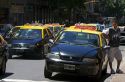 Taxi's on Cordoba Avenue in the Retiro barrio of Buenos Aires, Argentina.