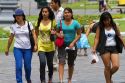 Pedestrians at the Plaza Mayor or Plaza de Armas of Lima, Peru.
