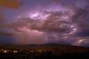 Lightning strikes during a thunderstorm on the first day of summer in Boise, Idaho, USA.