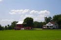 Farmhouse and red barn along U.S. Highway 10 near Brilliion, Wisconsin, USA.