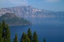 Crater Lake shrouded in smoke from forest fires in Crater Lake National Park located in southern Oregon, USA.