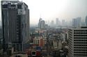 View of the Bangkok cityscape taken from the Baiyoke Tower II showing air pollution and smog, Thailand.