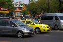 Bus and automobile traffic near the Grand Palace in Bangkok, Thailand.