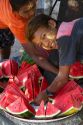 Street vendor selling sliced watermelon in (Rangoon) Yangon, (Burma) Myanmar.