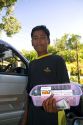 Burmese boy selling tobacco cigarettes in (Rangoon) Yangon, (Burma) Myanmar.