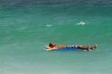 Man floating on an air matress in the Gulf of Thailand at Chaweng beach on the island of Ko Samui, Thailand.